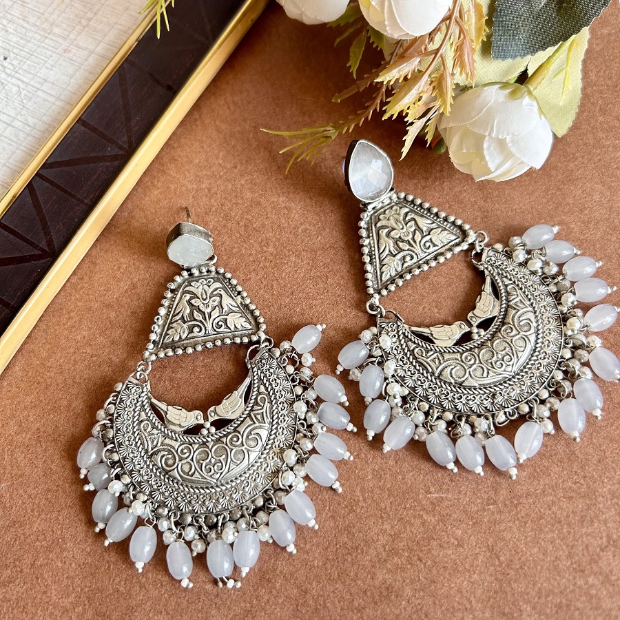 Secrets to Comfortably Wearing Heavy Earrings